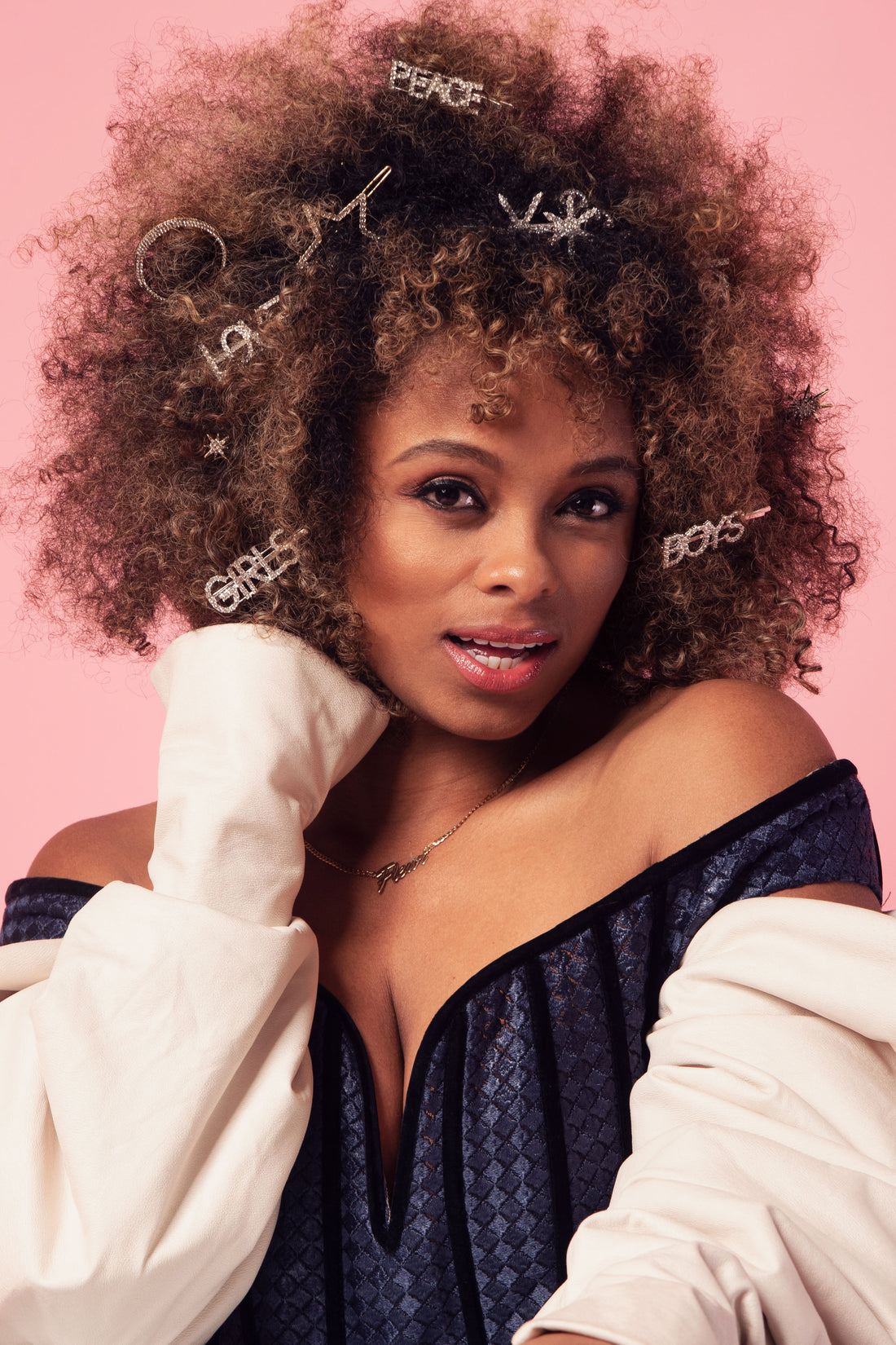 Singer Songwriter Fleur East wears April & Alex