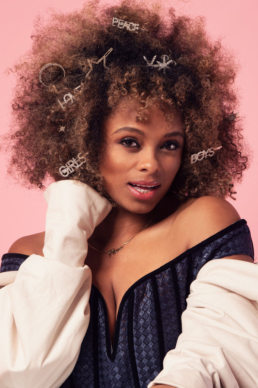 Singer Songwriter Fleur East wears April & Alex